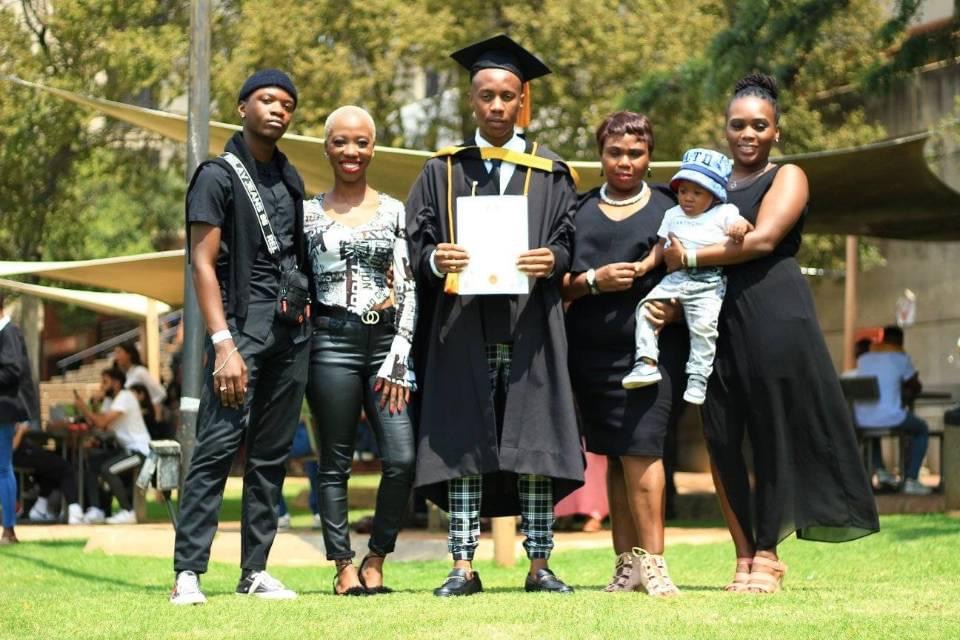 Sifiso Mdumbe celebrates his achievement with his family.